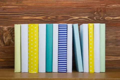 Stack of books on wooden table. Back to school. Copy space Stock Photos