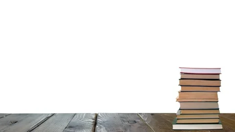 A stack of books on a wooden table, stop motion time laps. Bale, a pile of bo Stock Footage 169995360