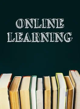 A stack of books with the words Online Learning written on top Stock Photos