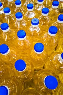 Stack of bottles with sunflower seed oil Foto stock
