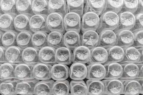 Stack of bottom plastic bottles texture for background Stock Photos