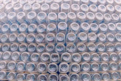 Stack of bottom plastic bottles texture for background Stock Photos
