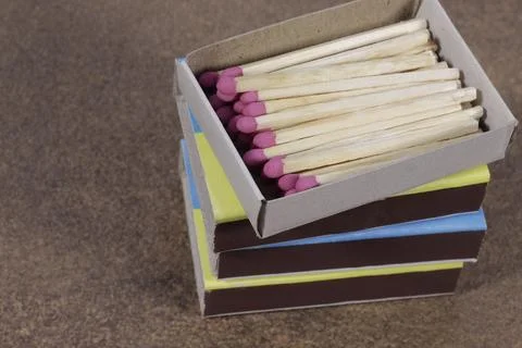 A stack of boxes of household matches with red sulfur heads. Stock Photos
