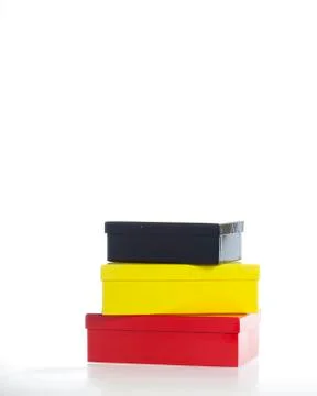 Stack of boxes - red, yellow, black Stock Photos