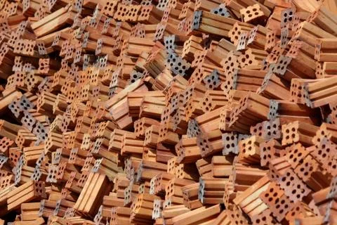 Stack of brick for construction as background Stockfoto's