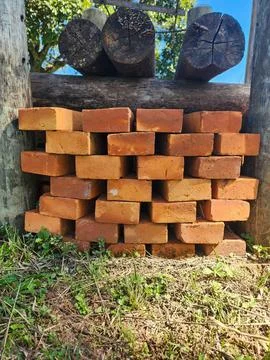Stack of Bricks and Logs Stock Photos