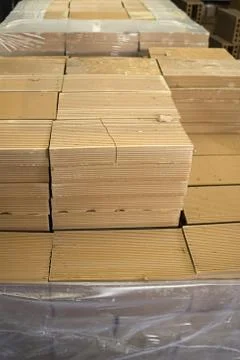 Stack of bricks in construction factory, industrial architecture Stock Photos
