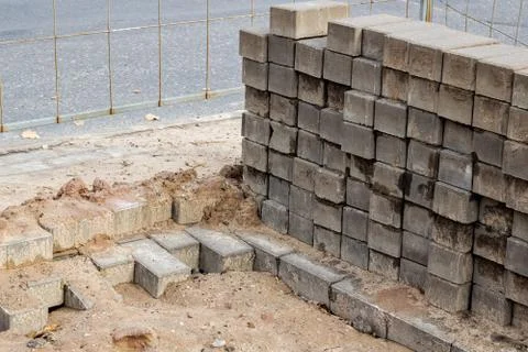 Stack of bricks at a construction site closeup Stock Photos