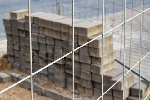 Stack of bricks at a construction site closeup 库存照片