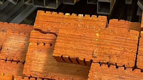 A stack of bricks with a few missing pieces Stock Photos