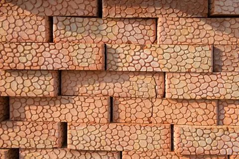 A stack of bricks with a pattern on the outside Stock Photos
