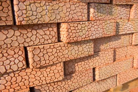 A stack of bricks with a pattern on the outside Stock Photos