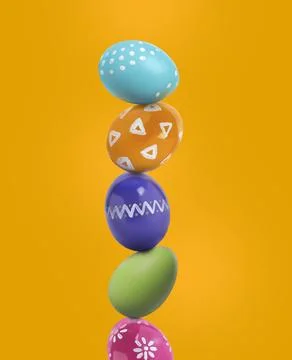 Stack of bright Easter eggs on goldenrod background Stock Photos