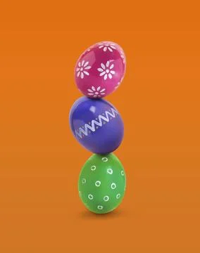 Stack of bright Easter eggs on orange background Stock Photos
