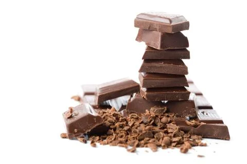 Stack of broken chocolate isolated Stock Photos