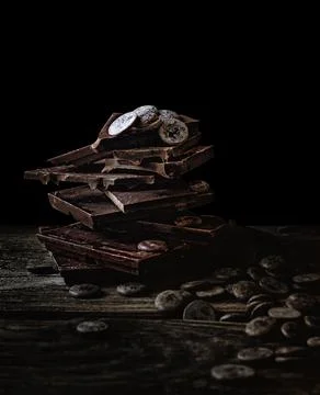 Stack of broken dark chocolate 스톡 사진