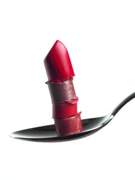  stack of broken lipsticks on spoon.tif Stock Photos
