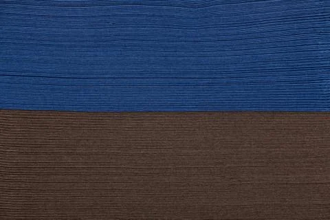 Stack of brown and blue napkin paper closeup texture. Stock Photos