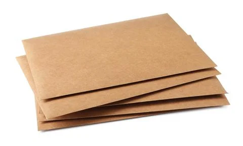 Stack of brown letters on white background 스톡 사진