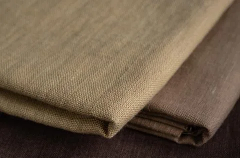 Stack of brown linen fabrics Stock Photos