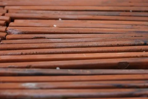 Stack of brown old vintage tiles. Stock Photos