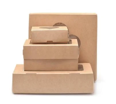 Stack of brown paper boxes with windows Stack of brown paper boxes with wi... Stock Photos