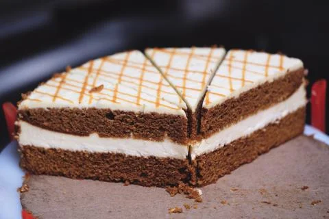 A stack of brownies with a crosshatch pattern. The brownies are cut into squa Stock Photos