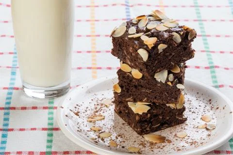 Stack of brownies on white plate Stock Photos