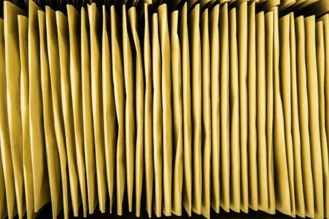 Stack of bubble envelopes inside a box. Close up, top view. Foto stock