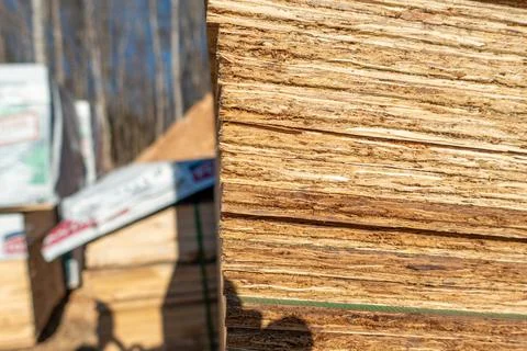 Stack of Building Lumber at Construction Site Fotos de archivo