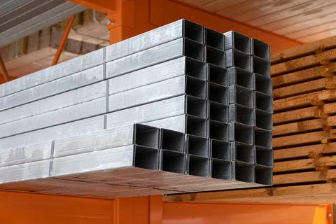 Stack of Building Material Aluminum Profile For Drywall At The Construction W Stock Photos