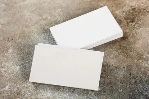 Stack of business cards blank mockup on grunge background mocap for design Stock Photos