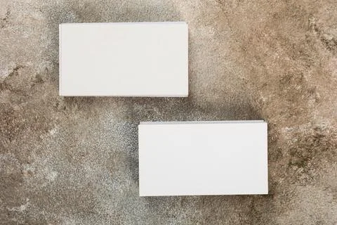 Stack of business cards blank mockup on grunge background mocap for design Stock Photos