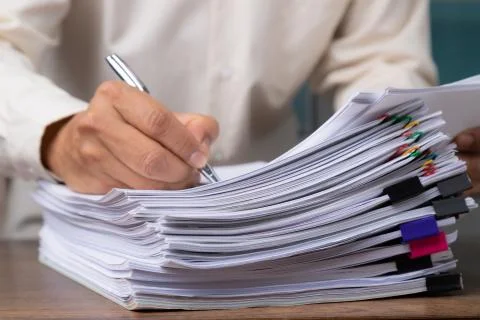 Stack of business overload paper. Stock Photos