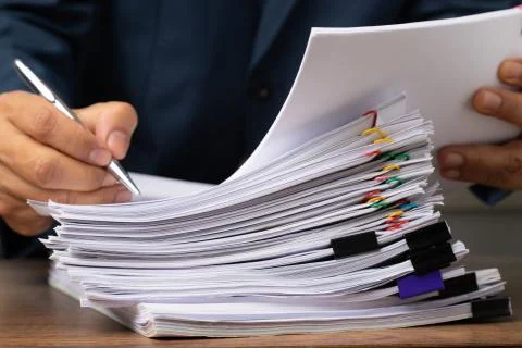 Stack of business overload paper. Stock Photos