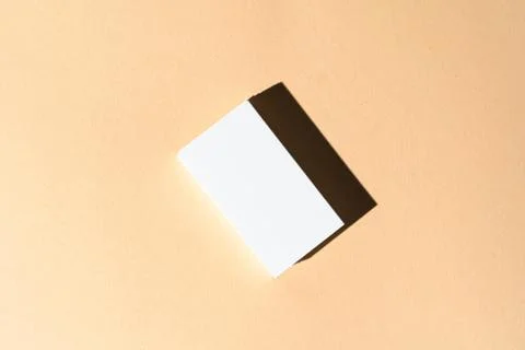 Stack of businesscards with copy space on beige background Stockfoto's