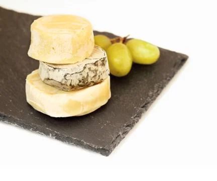 Stack of camembert cheese Stock Photos