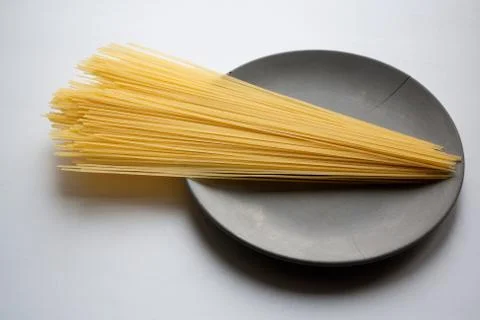 Stack of capellini pasta Stock Photos