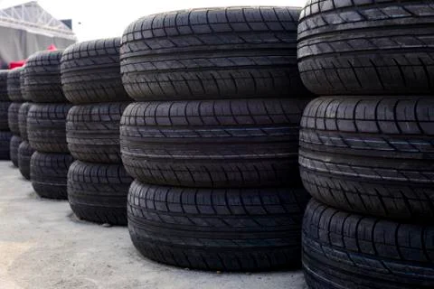 Stack of car tires on the floor Stock Photos