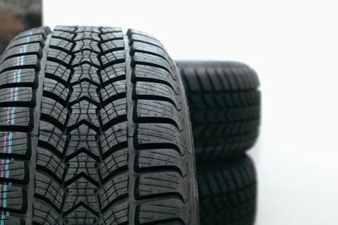 Stack car wheel winter tires isolated. New tyres. Place for text Stock Photos