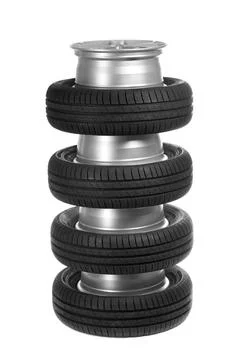 Stack of car wheels and tires. Stack of car wheels and tires. Isolate on w... 写真素材