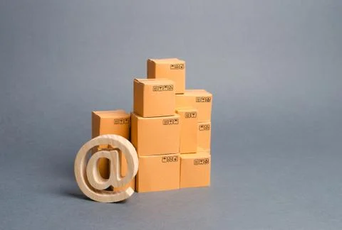 Stack of cardboard boxes and email symbol commercial AT. E-commerce. sales of 写真素材