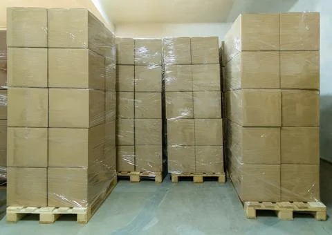 Stack of cardboard boxes ready to be shipped of a warehouse. Package storage Stock Photos