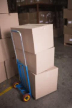 Stack of cardboard boxes in warehouse Stock Photos