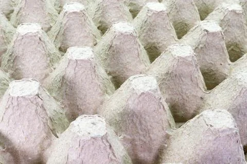 Stack cardboard packaging for eggs,Stack of paper, egg tray, texture backgrou Stock Photos