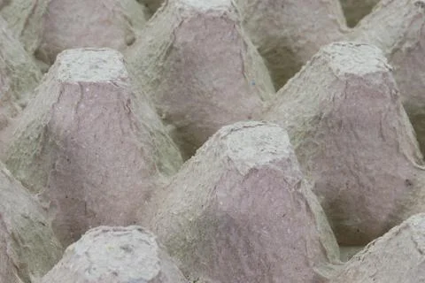 Stack cardboard packaging for eggs,Stack of paper, egg tray, texture backgrou Stock Photos