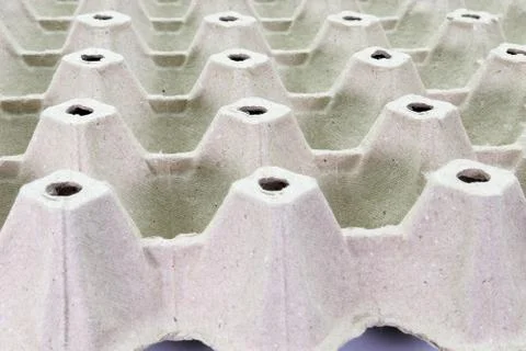 Stack cardboard packaging for eggs,Stack of paper, egg tray, texture backgrou Stock Photos