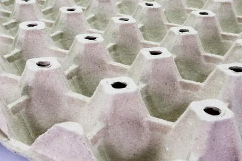 Stack cardboard packaging for eggs,Stack of paper, egg tray, texture backgrou Stock Photos