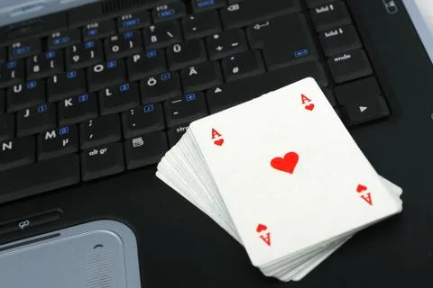 Stack of cards presenting online gambling Stock Photos