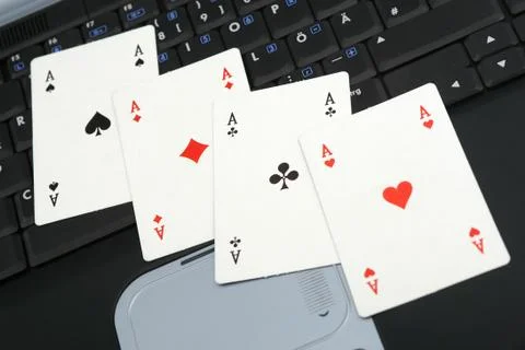 Stack of cards presenting online gambling Stock Photos